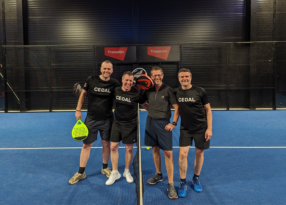 Four guys on a Padel court